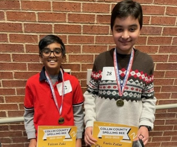  image of Plano ISD students Faizan Zaki and Faris Zafar with spelling bee medals and certificates